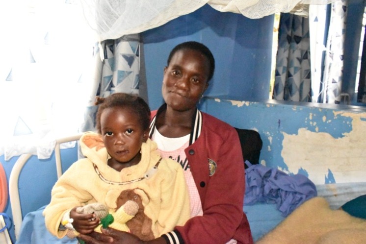 Stella and Joyline Stella and daughter after cleft lip surgery